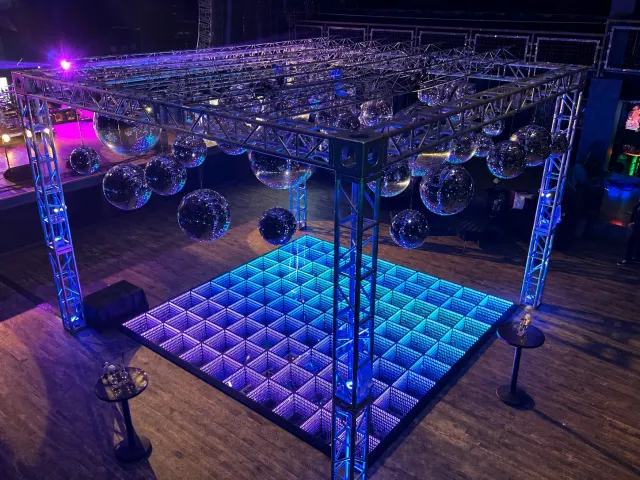 Mirror-ball installation over an infinity LED dance floor