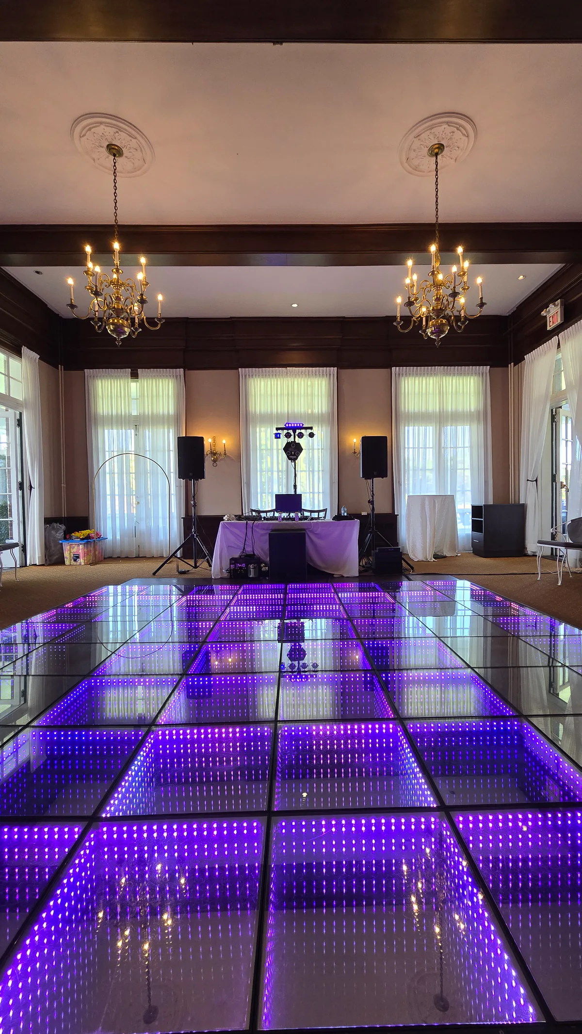 Purple infinity LED floor in a bright event room